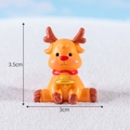 Miniature sitting Christmas reindeer figurine in bright orange with golden bell, 3.5cm height - No.7 Sitting Deer with Bell
