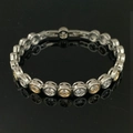 Elegante bracciale bicolore oro e argento con diamanti taglio circolare incastonati - Bracciale a Cerchio Bicolore SL330