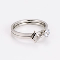 Close-up of silver butterfly ring set with matte texture and sparkling zircon stone - US 6 / Steel