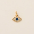 Exquis pendentif œil maléfique plaqué or avec cristal bleu central et pavé de zircons - Mauvais œil