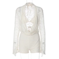 Detailed close-up of white lace jumpsuit set with long sleeve top and matching shorts - S / Apricot