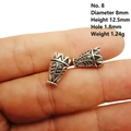 Close-up of 8mm antique silver alloy hollow heart floral beads for DIY jewelry - Style 8
