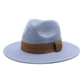 Classic blue woven straw Panama hat for women with a dark brown decorative band and flat brim - Sky Blue