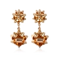 Golden double bow earrings with polished metallic finish and reflective mirror effect - Gold Bow Stud Earrings