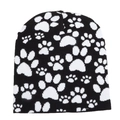 Warm winter knit beanie hat with white paw print jacquard pattern on black background - One Size / Black
