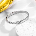 Industrial style silver stainless steel bracelet featuring a triple-layer gear strap design - Silver