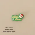 Mini resin Santa Claus charm with green background and relief details for DIY Christmas decor - No.80 - Resin Santa Claus Green Accessory