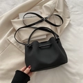 Black vintage bucket handbag with woven handles and adjustable shoulder strap - Black