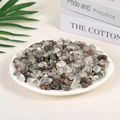 Mix of polished natural clear, pink, and yellow crystal stones in a white display tray - Green Phantom Quartz (9-12mm) 100g
