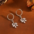 Elegant silver leaf earrings with sparkling zircons on a rustic textured background - Silver Leaf Hoop Earrings (T029)