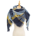 Women's blue, yellow, and grey plaid thick scarf with fringes on a mannequin - Blue Plaid