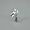 Macro detail of F136 titanium leaf lip stud with marquise zircon and dangling stone - 1.2x8mm / Steel