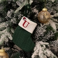 Green knitted Christmas stocking with red embroidered letter U on white faux fur cuff - Green/Letter U