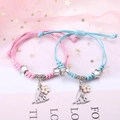 Rosa und blaue gewebte Paararmbänder mit Sternanhängern und Liebesanhängern - Blume Liebe (2er-Set - Buntes Seil)