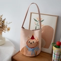 Pink canvas bucket bag with cartoon cat pattern and red checkered shoulder strap - Orange Cat