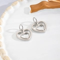 Detail of silver double-heart charms with polished finish for DIY jewelry crafting - Hollow Double Heart Silver