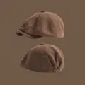 Brown wool newsboy cap with diagonal weave texture shown from front and back views - One Size (55-58cm) / Coffee