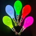 Close-up of five colorful LED glow sand hammer sticks with CE certification and ON/OFF switch - Glow Oval Sand Ball Wand Mixed Colors