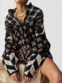 Close-up of thick knit cardigan texture and ethnic geometric patterns in black and brown - One Size / Black