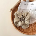 Brown and white houndstooth hair scrunchie in a woven basket with minimalist card - Houndstooth White
