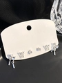 Silver earring set with butterfly, heart tassel, and rhinestones on card - 83 White K (4475)