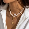 Three-layer boho necklace set featuring pearls, starfish and shell charms in gold - Gold (4222)