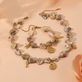 Fashionable shell necklace and bracelet set with golden starfish and conch pendants - Conch Set