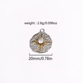Detail of a 20mm silver textured pendant with a gold star and zircon stone, 2.8g weight - Starry Texture Round (Style 11)