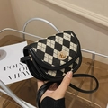 Mini saddle bag featuring black and white houndstooth canvas with gold twist lock closure - Diamond Lattice-Black