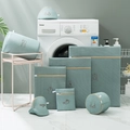 Close-up of mint green sandwich mesh laundry bags with embroidery icons and sturdy zippers - 20x30cm Pants Bag / Morandi Green