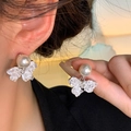 Elegant bow-shaped drop earrings with faux pearls and sparkling crystal stones - Silver Butterfly Pearl Crushed Stone