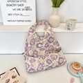 Floral canvas tote bag featuring purple daisies and butterflies with wide shoulder straps - Purple Floral