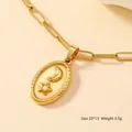 Golden oval celestial star moon pendant on a paperclip chain necklace, size 22x13mm - Moon & Star Charm / Gold