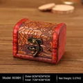 Small vintage wooden jewelry box in reddish brown with floral engraving and metal clasp - New Grapes