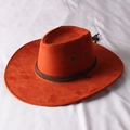 Close-up of orange-brown suede cowboy hat featuring woven band and metal side eyelets - One Size 58cm Circumference / Orange