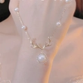Elegant gold reindeer antler pearl necklace worn by a model with a minimalist aesthetic - Gold Antler Pearl (60#)