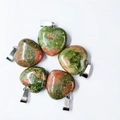 Set of five 15mm green and orange natural stone heart pendants with metal clasps - Unakite