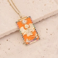 Golden Tarot Judgement pendant necklace with orange enamel and colorful gemstones - Judgement