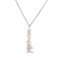 Detailed shot of handmade silver chain necklace featuring irregular pink quartz stone pendant - Rose Quartz Necklace