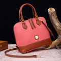 Detail of pink and brown leather patchwork shell bag with gold hardware and square metal plate - Hot Pink