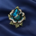 Spilla rosa elegante con cristallo blu a goccia e strass su base in oro retrò - Blu
