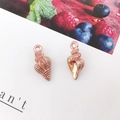 Ciondoli a conchiglia in oro rosa con trama a spirale per creazione di gioielli - Conchiglia Rosa (9×19mm)