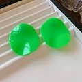 Detailed macro view of fluorescent green leaf-shaped resin earrings on white display tray - 27# Silver Needle-Fluorescent Green Wave