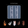 Detailed macro view of swan relief silicone nail art mold and its resin finished pieces - Swan 05