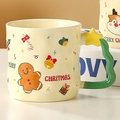 Weihnachtsbecher aus Keramik mit Lebkuchenmann-Motiv und grünem Wellengriff - Lebkuchenmann - Einzelne Tasse