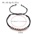 Adjustable black braided rope bracelet with rose gold beads and size specifications - Rose Gold