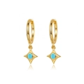 Detailed shot of gold-tone evil eye earrings with star charm and blue zircon stone - Blue Turquoise