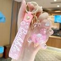 Cute pink glowing liquid turtle keychain with silicone wrist strap and glitters - Turtle Bubble Bead - Pink
