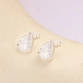 Macro shot of S925 sterling silver stud earrings with pear-cut clear zircon stones - S925 Sterling Silver Water Drop / White