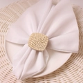 Square rattan woven napkin ring holder on a white fabric napkin for table setting - Square Type 1